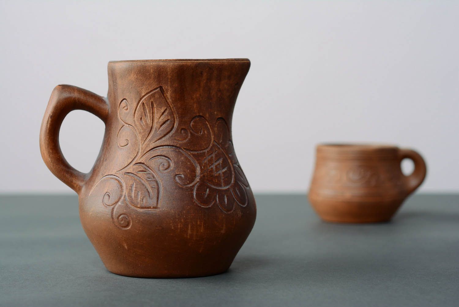 A small jug with patterns.