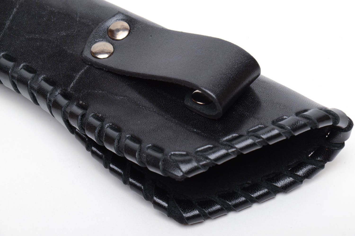 Black case for hunting knife made of leather