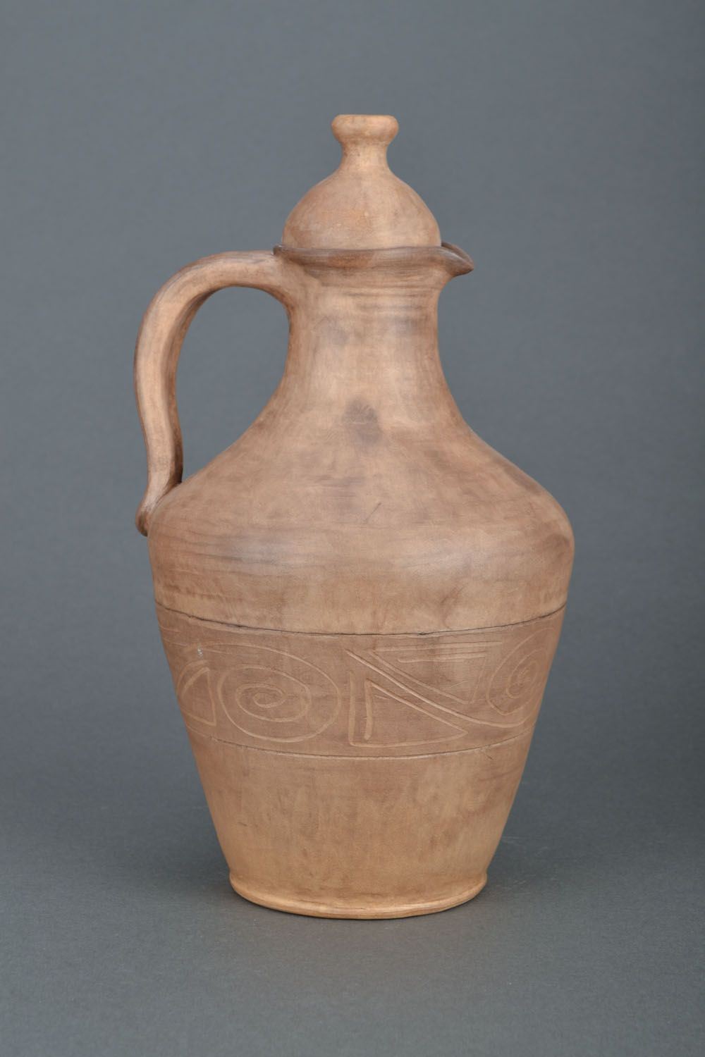 The clay jug is made manually.