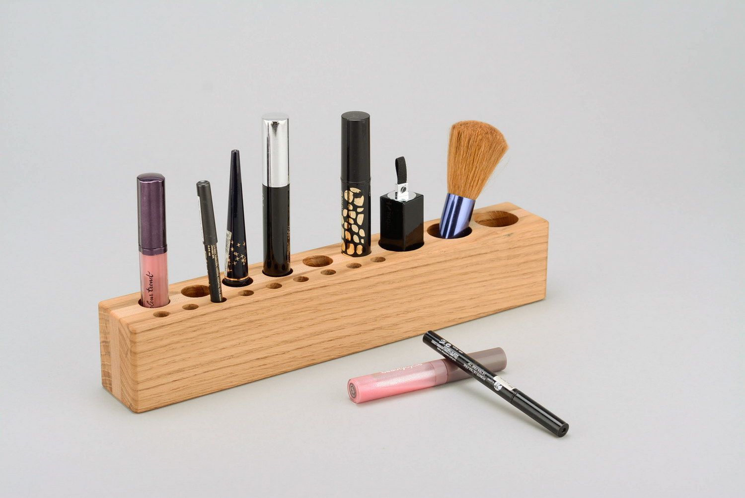 Stand for cosmetics made of wood.