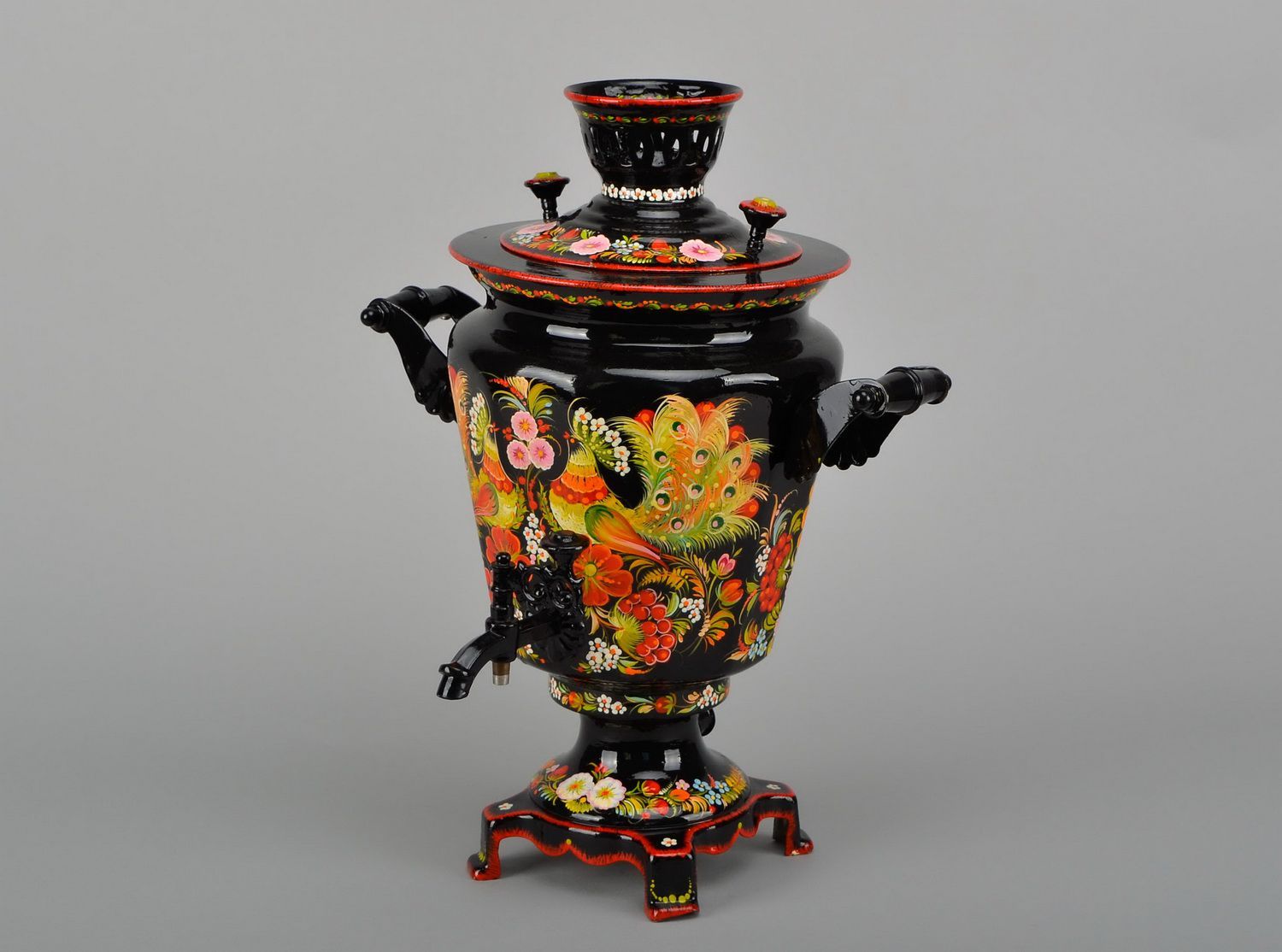 Electric samovar with hand painted patterns.