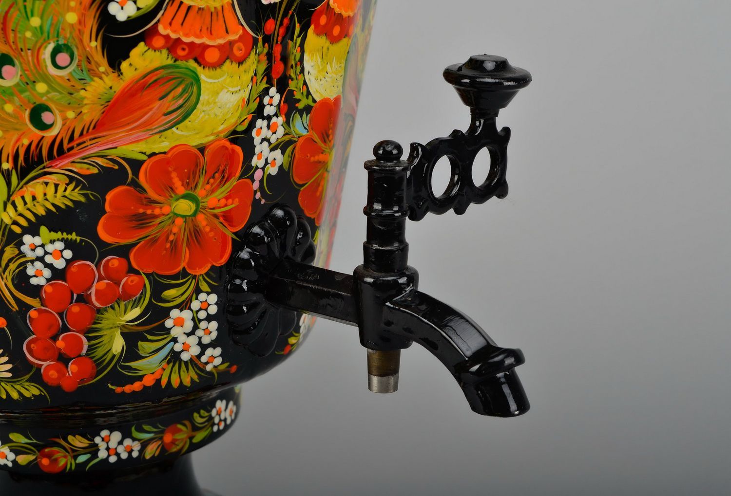 Electric samovar with hand painted patterns.